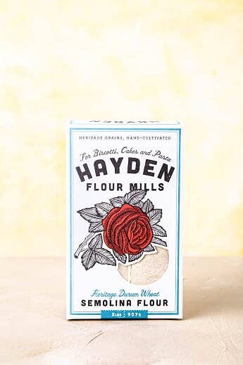 Hayden Flour Mills Semolina Flour box with a red rose design, highlighting its heritage durum wheat, ideal for pasta, biscotti, and cakes.