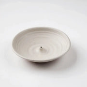 Gravesco Pottery - Incense Burner, a hand-thrown white ceramic dish with central post for incense sticks, designed to catch ash. Perfect for enhancing ambiance in any kitchen space.