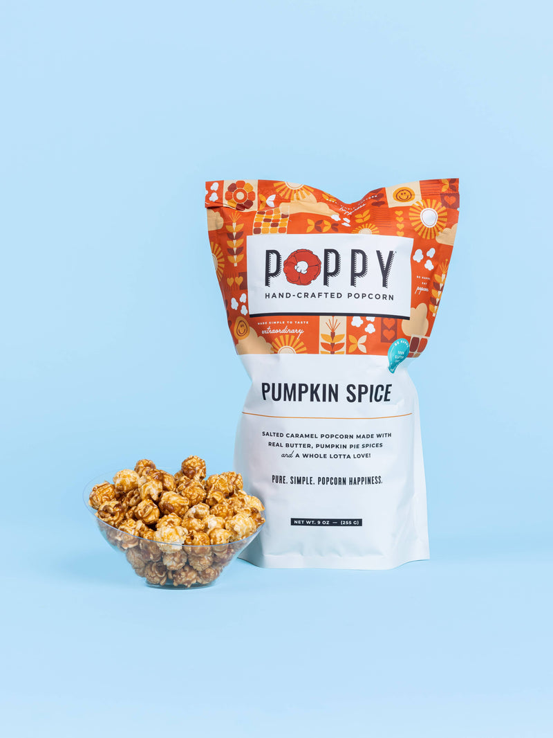 Poppy Hand-Crafted Popcorn - Pumpkin Spice Popcorn in a 9 oz bag, paired with a bowl of salted-caramel, pumpkin-pie–spiced popcorn.