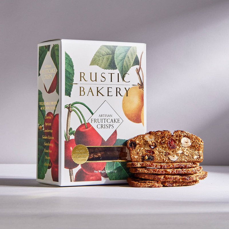 Rustic Bakery - Artisan Fruitcake Crisps Christmas: Box and crisps featuring fruits and nuts, ideal for holiday indulgence from Athens Cooks' specialty food selection.