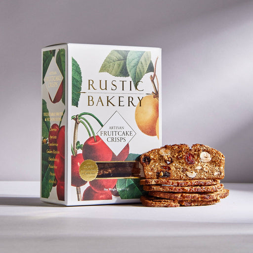 Rustic Bakery - Artisan Fruitcake Crisps Christmas: Box and crisps featuring fruits and nuts, ideal for holiday indulgence from Athens Cooks' specialty food selection.