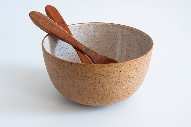RachaelPots - Salad Serving Bowl: Nude/Sage with wooden utensils, hand-thrown in Brooklyn, ideal for serving 6-8, microwave and dishwasher safe, perfect for compact table settings.