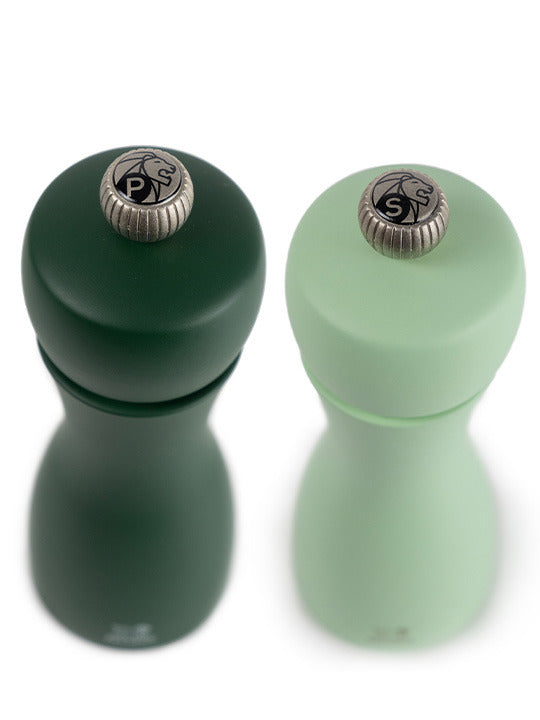 Peugeot | Tahiti Duo Salt + Pepper Mills, Water: A pair of elegant green wood mills with S and P metal knobs for adjustable grinding.