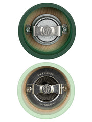 Peugeot | Tahiti Duo Salt + Pepper Mills showing their branded grinding mechanisms, featuring a dark and mint green wooden design, embodying natural elegance and functionality.