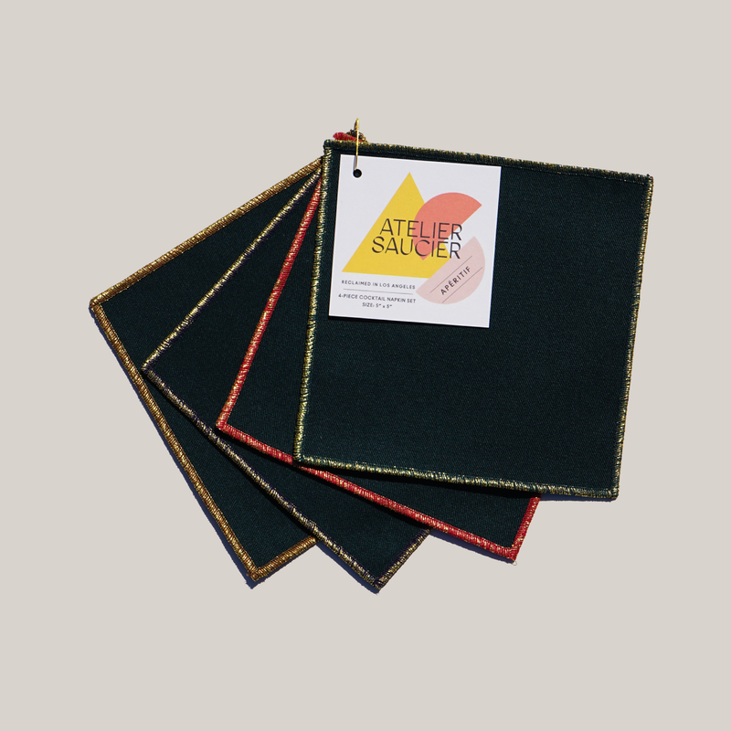 ATELIER SAUCIER - Tinsel Cocktail Napkins | Set of 4, featuring deep green fabric with metallic edges, perfect for festive cocktail settings.
