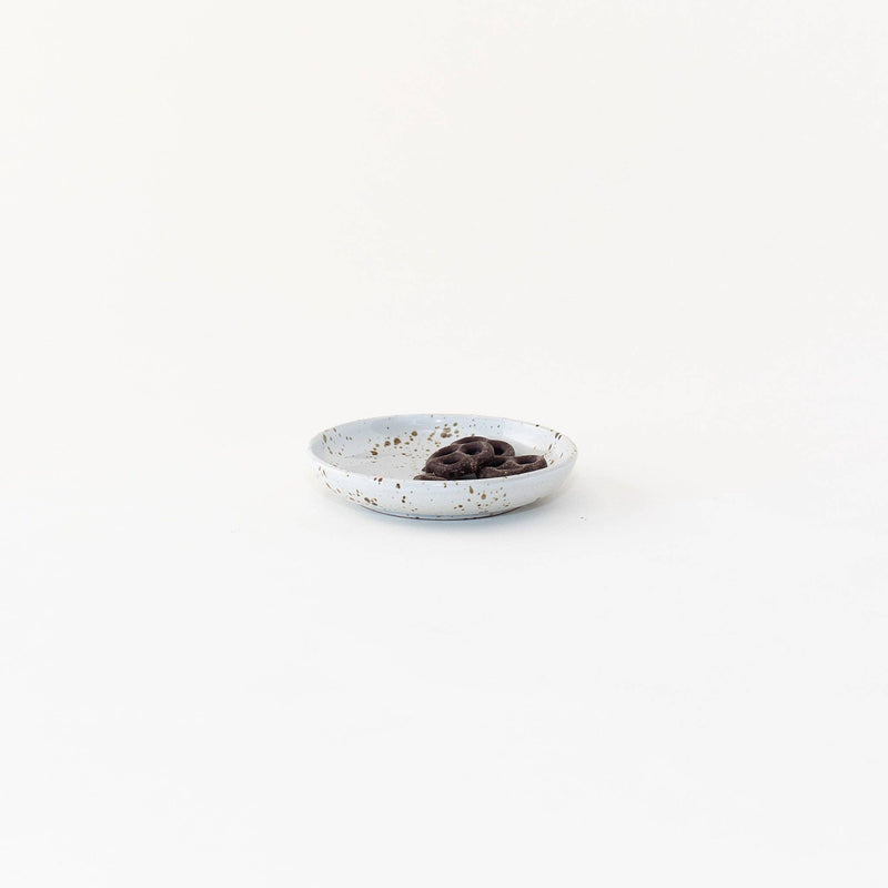 Sarah Kersten - Olive Dish: Basin Collection: Classic White, showcasing a small, elegant dish ideal for appetizers like chocolate-covered pretzels, embodying versatility and charm in kitchenware.