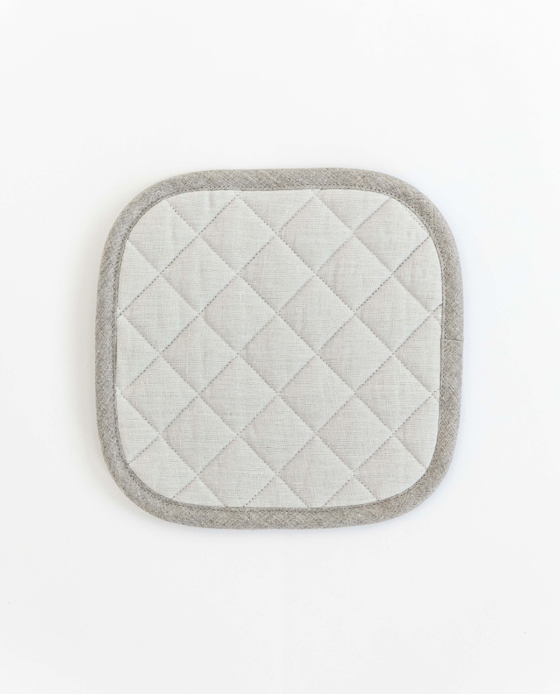 MagicLinen linen pot-holder, square-shaped, featuring quilted detailing and a hanging loop, ideal for heat protection in the kitchen.
