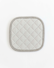MagicLinen linen pot-holder, white and square, with quilted detailing and hanging loop, ideal for heat protection in the kitchen.