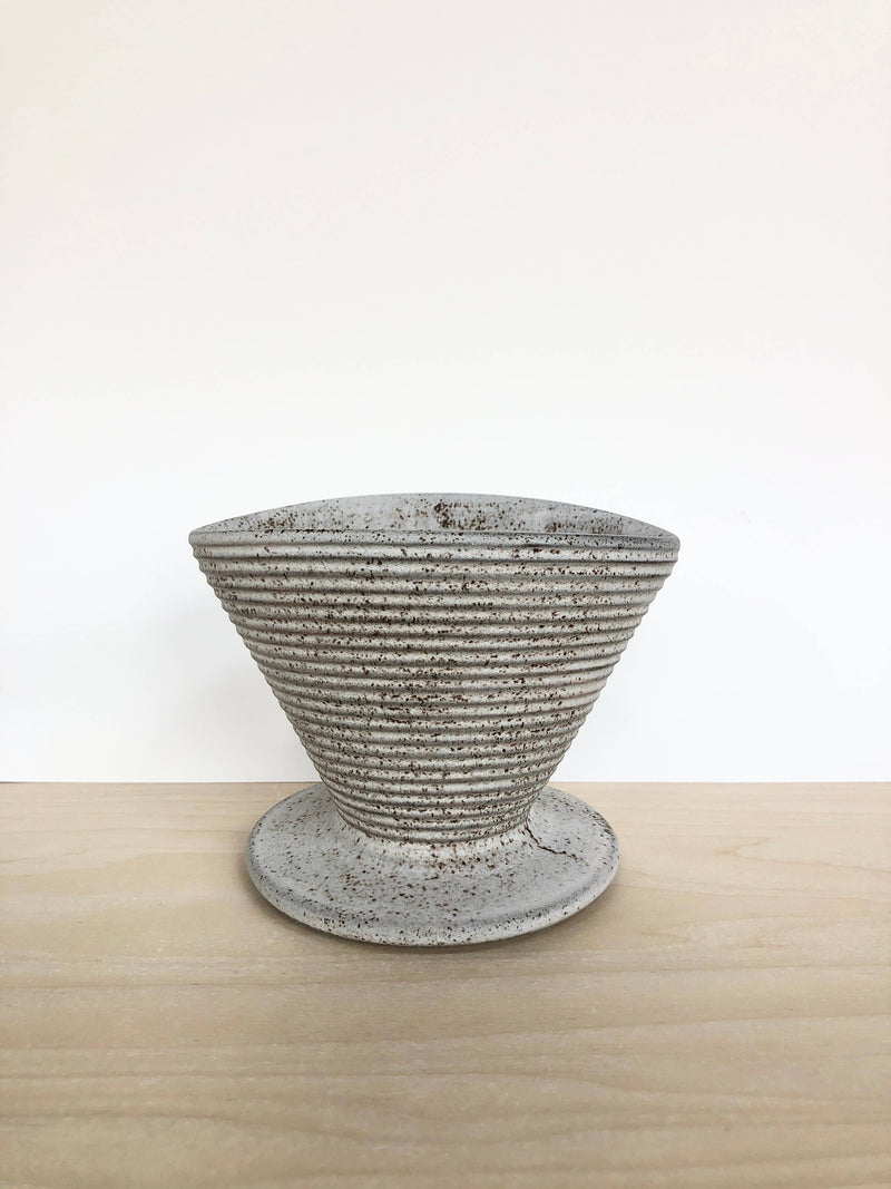 Jessica Wertz Ceramics - Grey Coffee Pour Over, a handmade, ribbed ceramic dripper on a base, ideal for crafting artisanal coffee with ease and style.