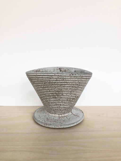 Jessica Wertz Ceramics - Grey Coffee Pour Over, a handmade, ribbed ceramic dripper on a base, ideal for crafting artisanal coffee with ease and style.