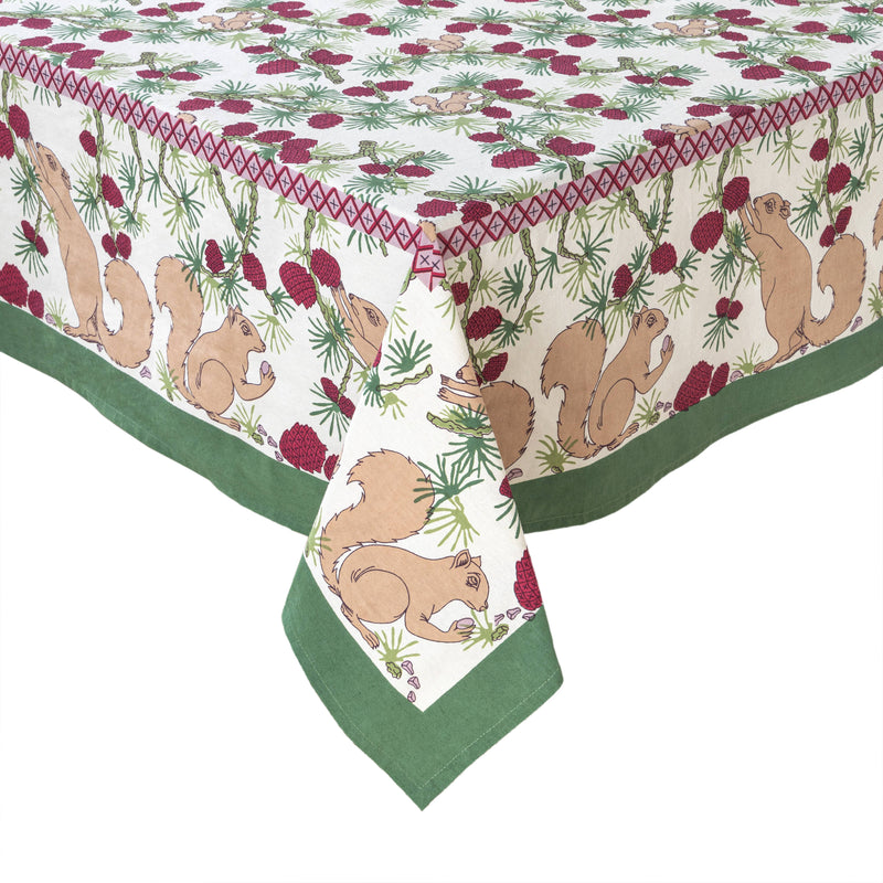 Couleur Nature - Squirrel and Pinecone Red & Brown Tablecloth: 71 x 71, featuring handprinted squirrels and pine cones on a white background, ideal for festive and casual gatherings.