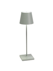 Zafferano America - Poldina Pro Cordless Lamp: Rust, a sleek metal lamp with a conical shade, ideal for modern kitchen settings. Features touch dimming and cordless LED lighting.