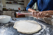 Earlywood | French Rolling Pin - Jatoba featured in use, highlighting its tapered design for precise dough shaping, ideal for recreating fine patisserie-style baked goods.