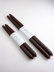 Mo&Co Home - Chestnut dipped beeswax taper candles, handcrafted with 100% USA beeswax, shown in 10-inch and 14-inch bundles, tied by cotton wicks.