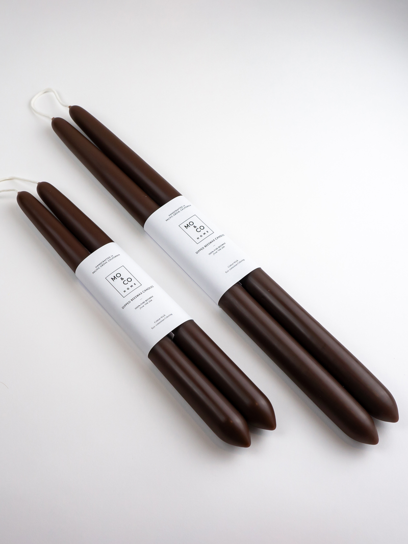 Mo&Co Home - Chestnut dipped beeswax taper candles, handcrafted with 100% USA beeswax, shown in 10-inch and 14-inch bundles, tied by cotton wicks.