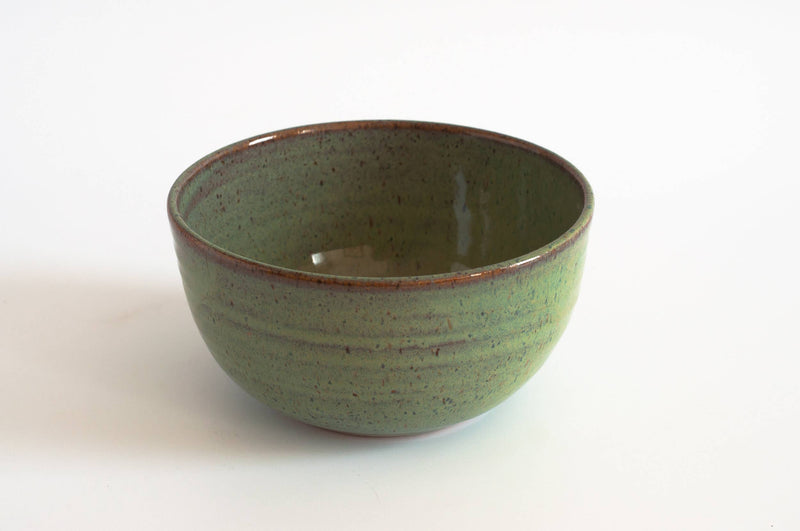 RachaelPots - Laura Bowl: Coral, a handcrafted speckled green ceramic bowl with a ribbed exterior, ideal for versatile meal use.