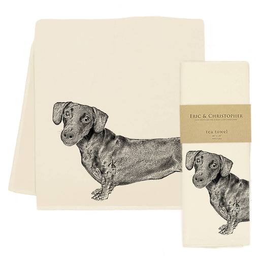 Eric & Christopher - Dachshund Tea Towel featuring a detailed dachshund illustration, laid flat and folded with label, crafted from 100% pre-shrunk cotton.