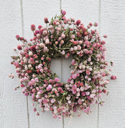 Alissas Flower Farm - Wreath: Totally Gomphrena: Raspberry displayed against a white wall, featuring a delicate arrangement of Raspberry Gomphrena flowers, suitable for indoor decoration.