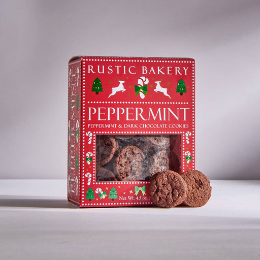 Rustic Bakery - Peppermint Cookies (12 Boxes) Christmas; red package with holiday motifs, showcasing dark chocolate peppermint cookies through a clear window.