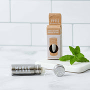 MABLE - Stainless Steel Floss Container with silk floss, featuring a shatterproof dispenser and minty, compostable floss for eco-friendly dental care.
