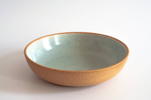 RachaelPots - Pasta Bowl Large: Nude/Light Blue, speckled design, ideal for family meals, hand-thrown ceramic, microwave and dishwasher safe, displayed on a white surface.