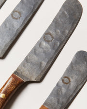 Detail of hammered stainless steel blade and mango wood handle on Farmhouse Pottery cheese knife