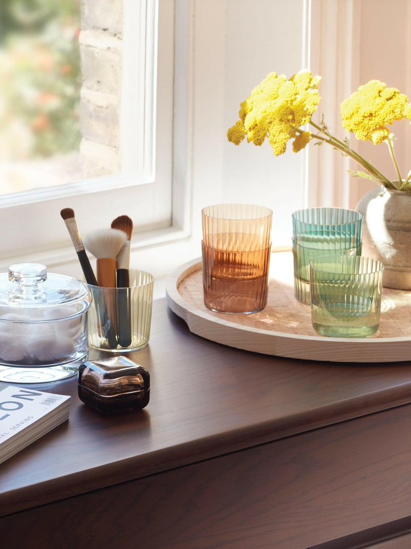 Set of four LSA International Gems Tumblers, 19oz, featuring fluted texture and hand-painted amber finish, ideal for both casual and formal gatherings.