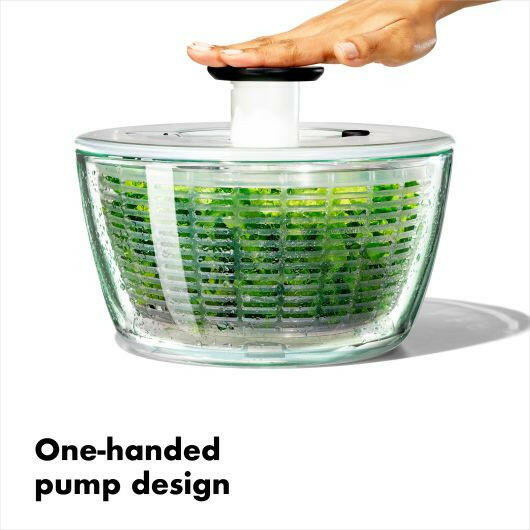 OXO Good Grips Salad Spinner with non-slip knob and built-in brake, perfect for quick drying and serving salads. Ideal for kitchen enthusiasts from Athens Cooks.