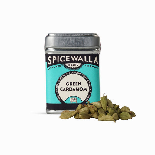 Spicewalla | Whole Green Cardamom tin with loose pods in front, highlighting potent seeds ideal for diverse culinary uses in Athens Cooks' curated kitchen.
