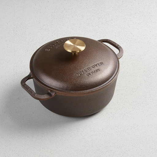 Smithey 3.5-quart cast iron Dutch oven with domed lid and gold-toned knob