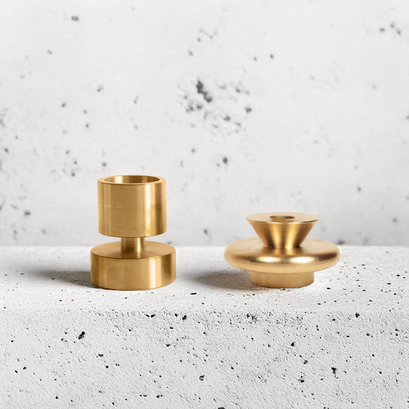 Solid brass candle holder, elegantly designed, perfect for standard 7/8 taper candles, displayed on a white surface, reflecting Athens Cooks' curated kitchenware.