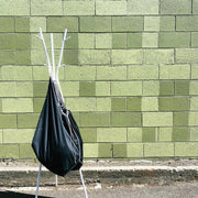 Marley's Monsters Washable Pail Liner - Large, featuring durable, water-resistant PUL fabric with a drawstring closure and cotton strap for versatile hanging and eco-friendly use.