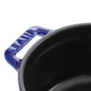 Staub | Mini Round Dutch Oven, Dark Blue, 0.25 QT., showcasing its blue enameled side handle and dark cast-iron interior, perfect for single-serve creations.