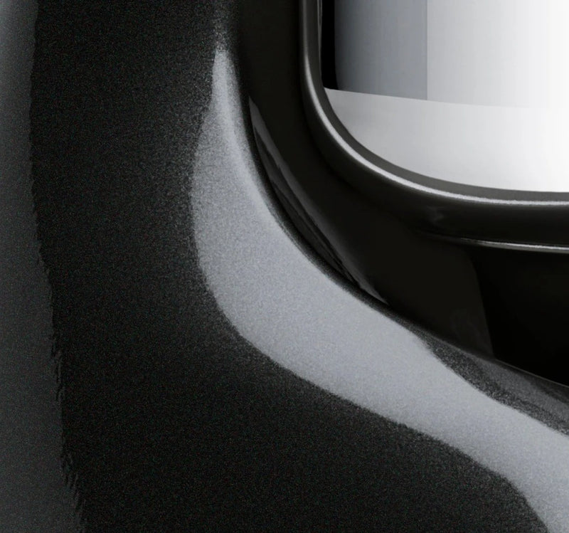 Ankarsrum Assistent Original's sleek black bezel and matte surface, showcasing its elegant craftsmanship for efficient dough mixing in any kitchen.