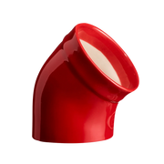Emile Henry | The Salt Pig: A glossy-red, 45° elbow-shaped kitchen accessory with a smooth interior, designed for easy salt access and clump-free storage.