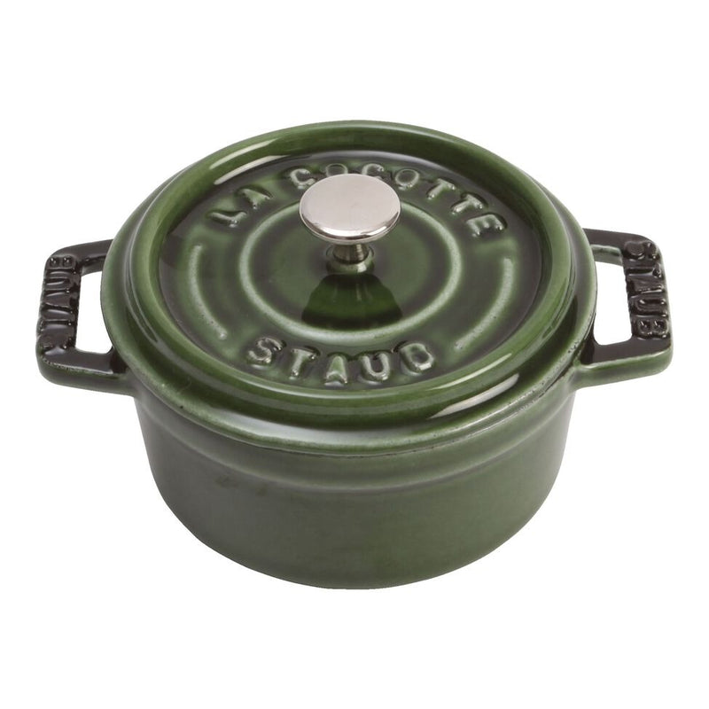 Staub | Mini Round Dutch Oven, Basil, 0.25 QT. A small, lidded cast-iron pot with handles, ideal for single-serve dishes like molten chocolate cake or French onion dip.