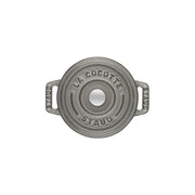 Staub | Mini Round Dutch Oven, Graphite, 0.275 QT: Top view of lid with side handles and central knob, ideal for single-serve culinary creations.