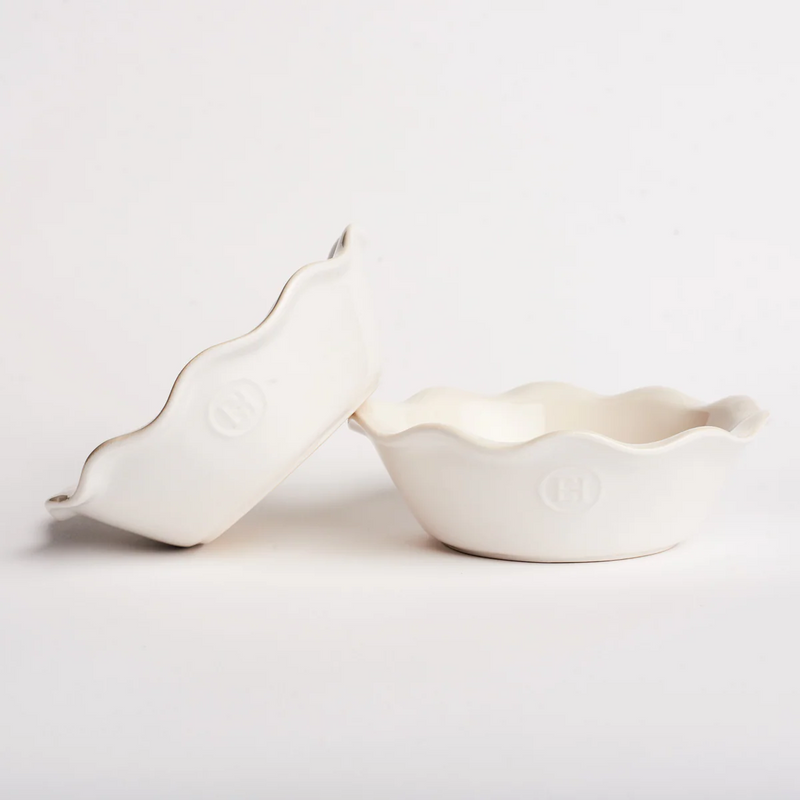 Emile Henry | Modern Classics Mini Pie Dish Set of 2, 5.5 x 1.5, featuring scalloped rims and embossed emblems, ideal for even pie baking.
