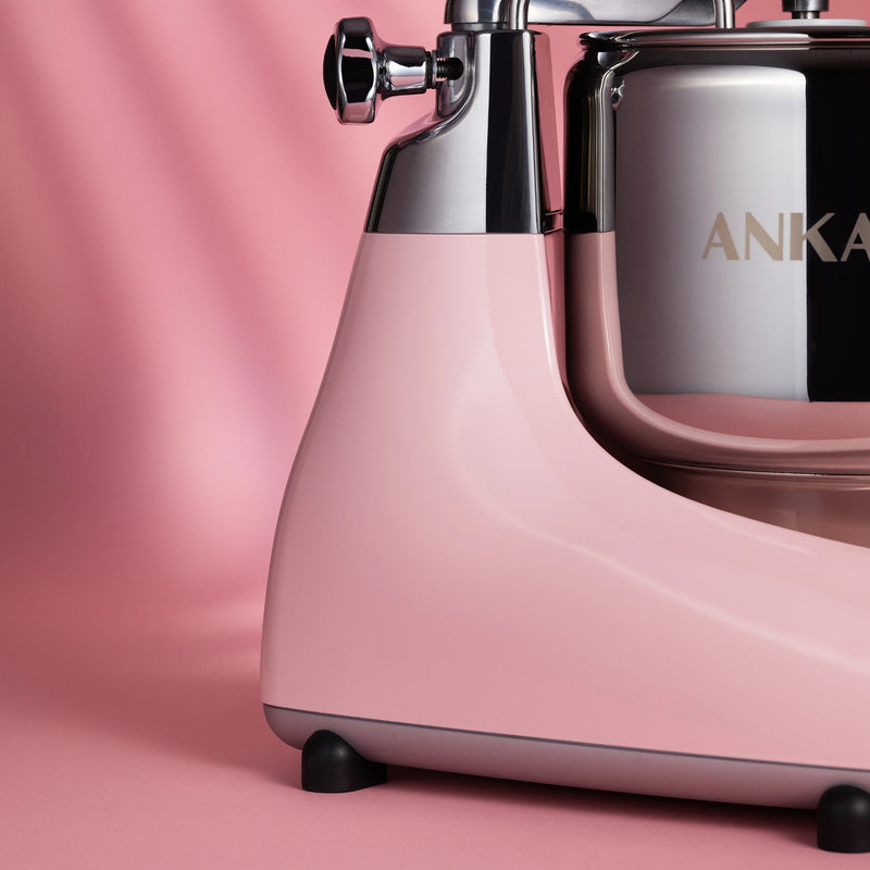Ankarsrum | Stand Mixers, Cloudy Pink, featuring a stainless-steel head and 7-liter bowl, ideal for versatile baking in your Athens Cooks kitchen.