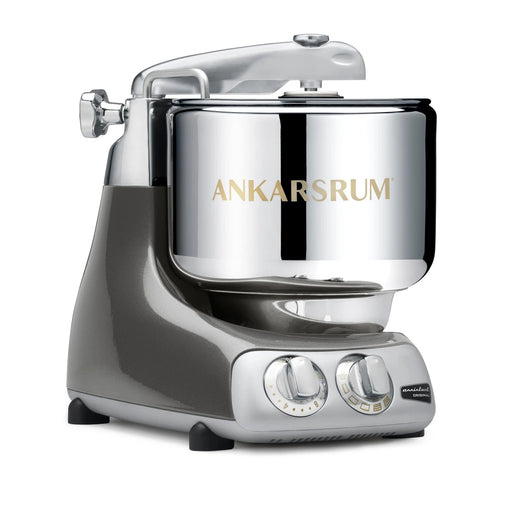 Ankarsrum Assistent Original stand mixer with stainless-steel bowl on grey base, featuring dual dials, ideal for heavy dough mixing, available at Athens Cooks.