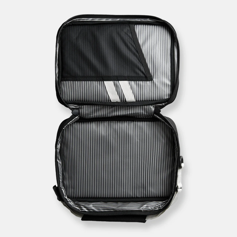 PlanetBox Rover-Launch Carry Bag - Black Currant, featuring a striped inner lining, mesh pocket, and elastic straps, ideal for transporting lunch essentials.