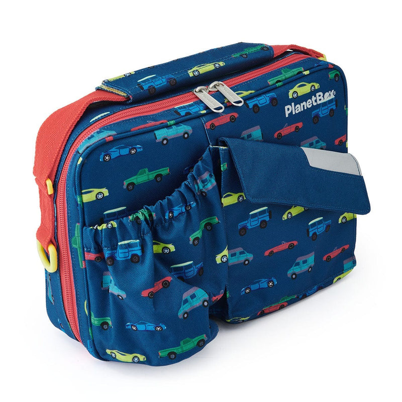 PlanetBox | Rover & Launch Carry Bag, Traffic Jam: A blue insulated lunch tote with car prints, red zipper, shoulder strap, and PlanetBox logo. Ideal for organized, fresh meals.