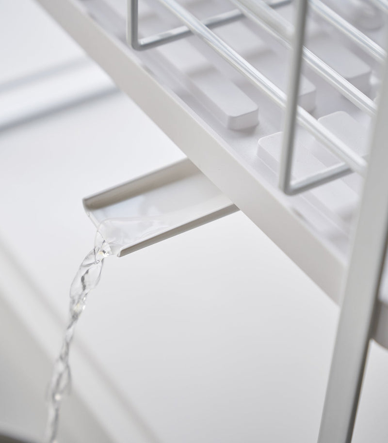 Yamazaki Home | Two-Tier Dish Rack, White with detachable drip tray and 360-degree spout, maximizing drying space and functionality for efficient kitchen organization.