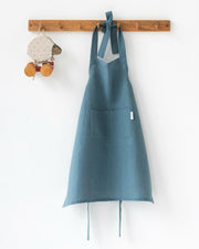 Kid's linen apron in gray blue for ages 7-10, perfect for kitchen or craft activities, ensuring comfort and style while keeping clean.