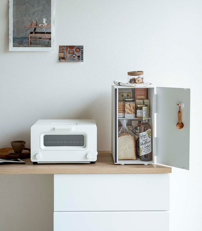 Yamazaki Home Bread Box, Vertical, Steel + Wood on counter; open mini-fridge stores bread, elderflower cordial, jams, and snacks for an organized kitchen.