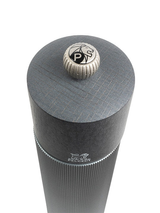 Peugeot | Line Pepper Mill - Carbon - 9, featuring a sleek cylindrical design with a distinctive logo on top, ideal for enhancing your kitchen tool collection.