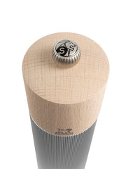 Peugeot | Line Salt Mill, Aluminum + Beechwood, Natural, 9 inches, features a ribbed metal base, smooth wooden top, and adjustable steel grinding mechanism. Ideal for dry salt crystals.