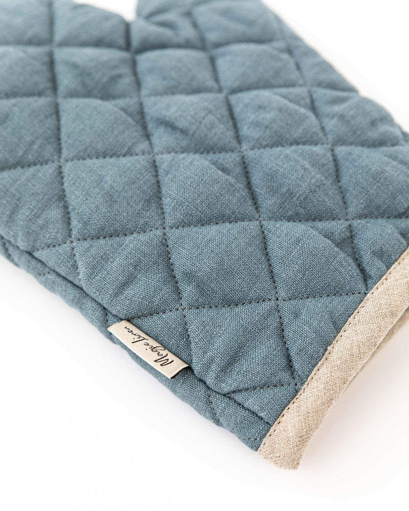 MagicLinen Linen Oven Mitts in Chocolate Brown feature a quilted design with heat-insulating padding, providing essential protection for your hands during cooking and baking.