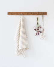 MagicLinen | Linen Tea Towels - Striped in Natural, showcasing a soft, absorbent linen towel with a handy loop, ideal for stylish, practical kitchen use.