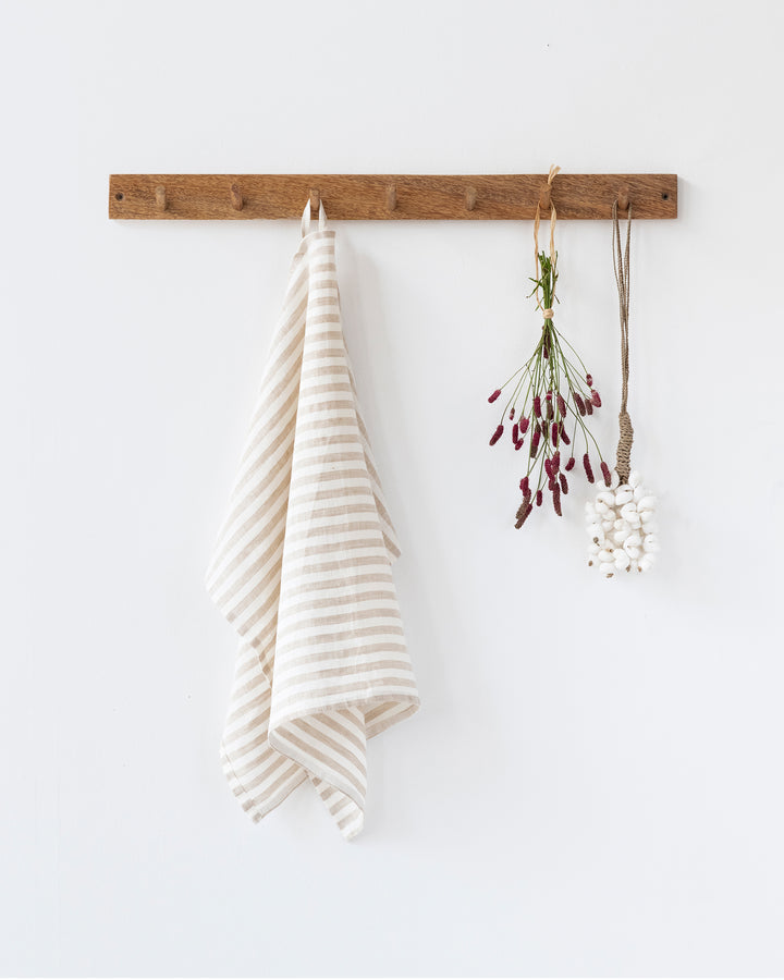 MagicLinen | Linen Tea Towels - Striped in Natural, showcasing a soft, absorbent linen towel with a handy loop, ideal for stylish, practical kitchen use.